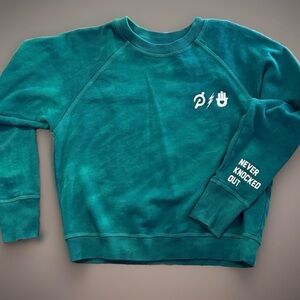 Spiritual gangster, Peloton women’s size small Kendall Toole never knocked out